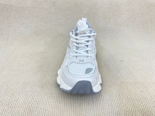 Women white running shoes with thick soled and breathable mesh upper