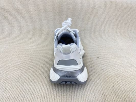 Women white running shoes with thick soled and breathable mesh upper