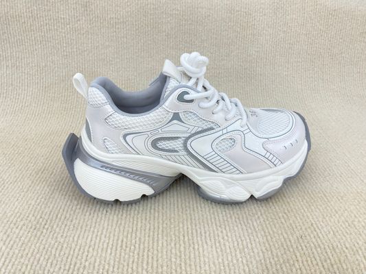 Women white running shoes with thick soled and breathable mesh upper